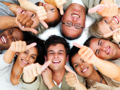 Group of business people lying against white background with thu